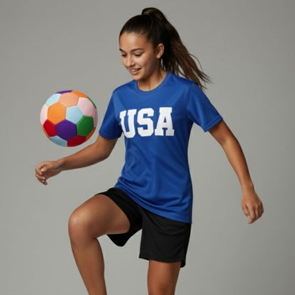 Person wearing a blue 'USA' t-shirt with The House Ball on a gray background