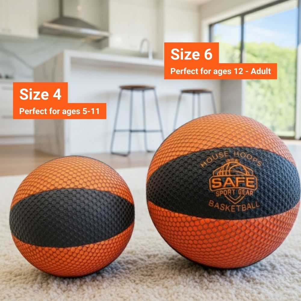 Two HouseHoops Basketballs, one size 4 and one size 6, on a carpeted floor with a kitchen background.