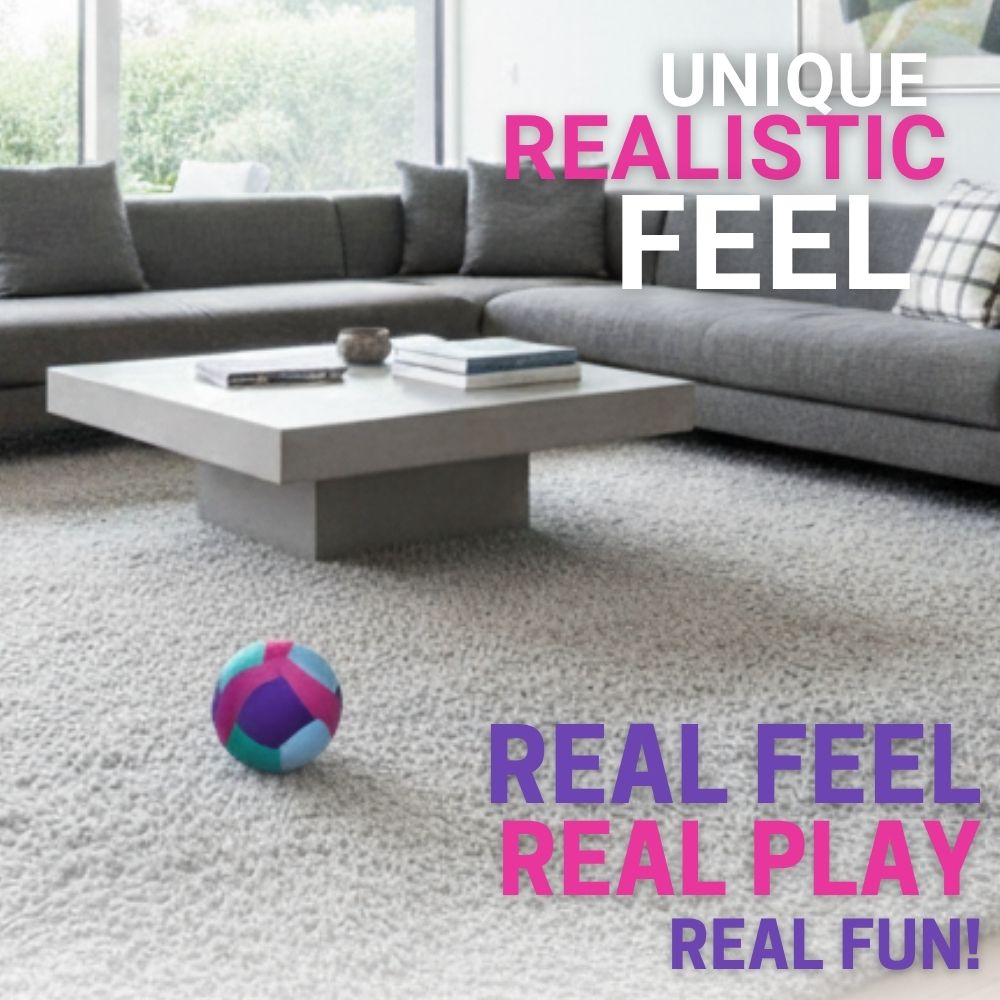 Living room with a gray sectional sofa, white coffee table, and Softy Volleyball-Teal on a carpet.