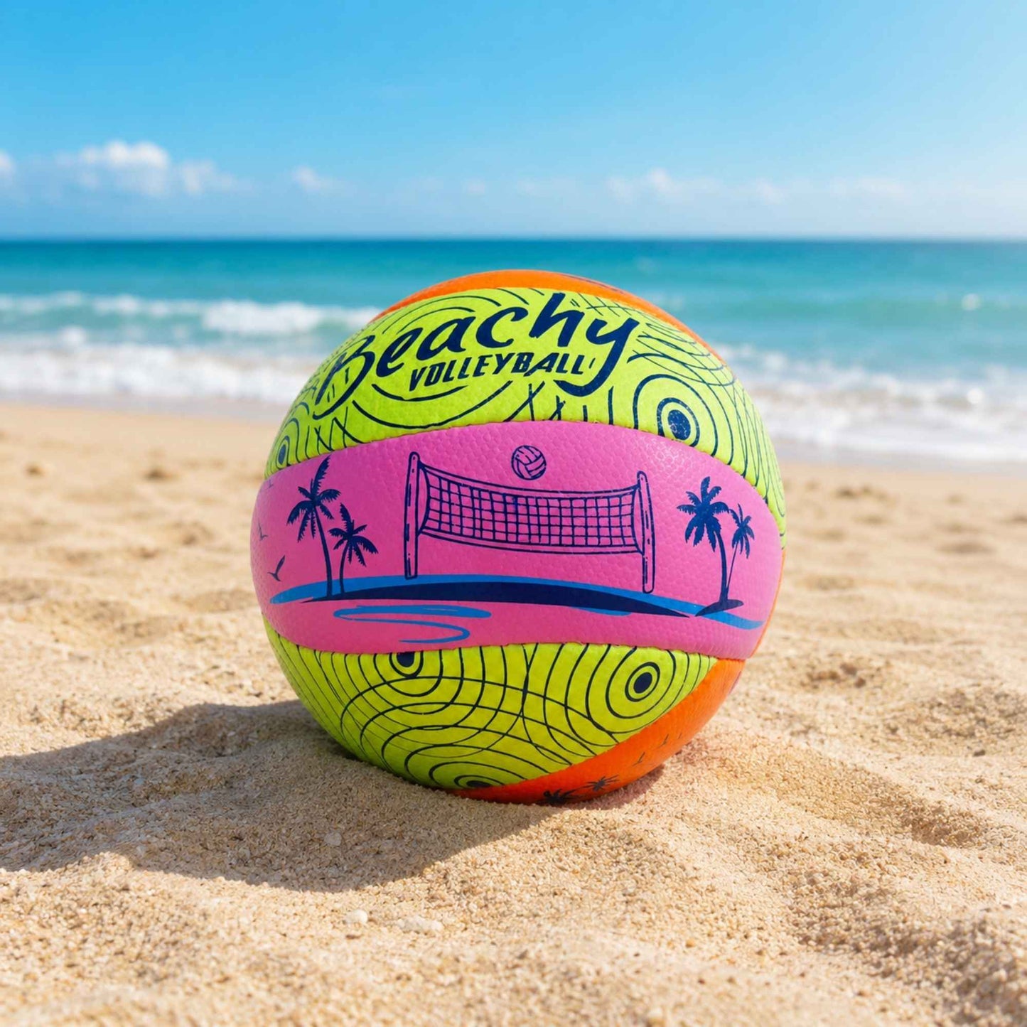 Beachy Volleyball on a sandy beach with ocean in the background